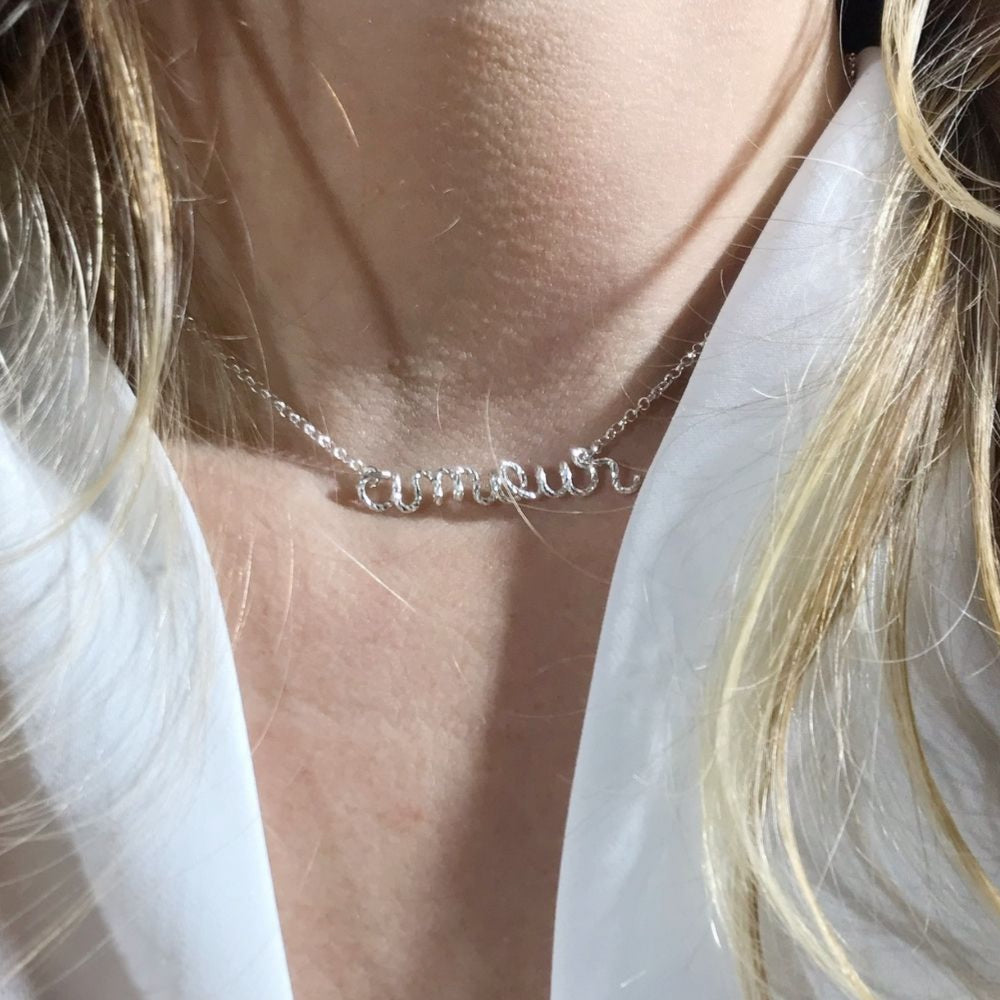 
                      
                        Collier à message personnalisé
                      
                    